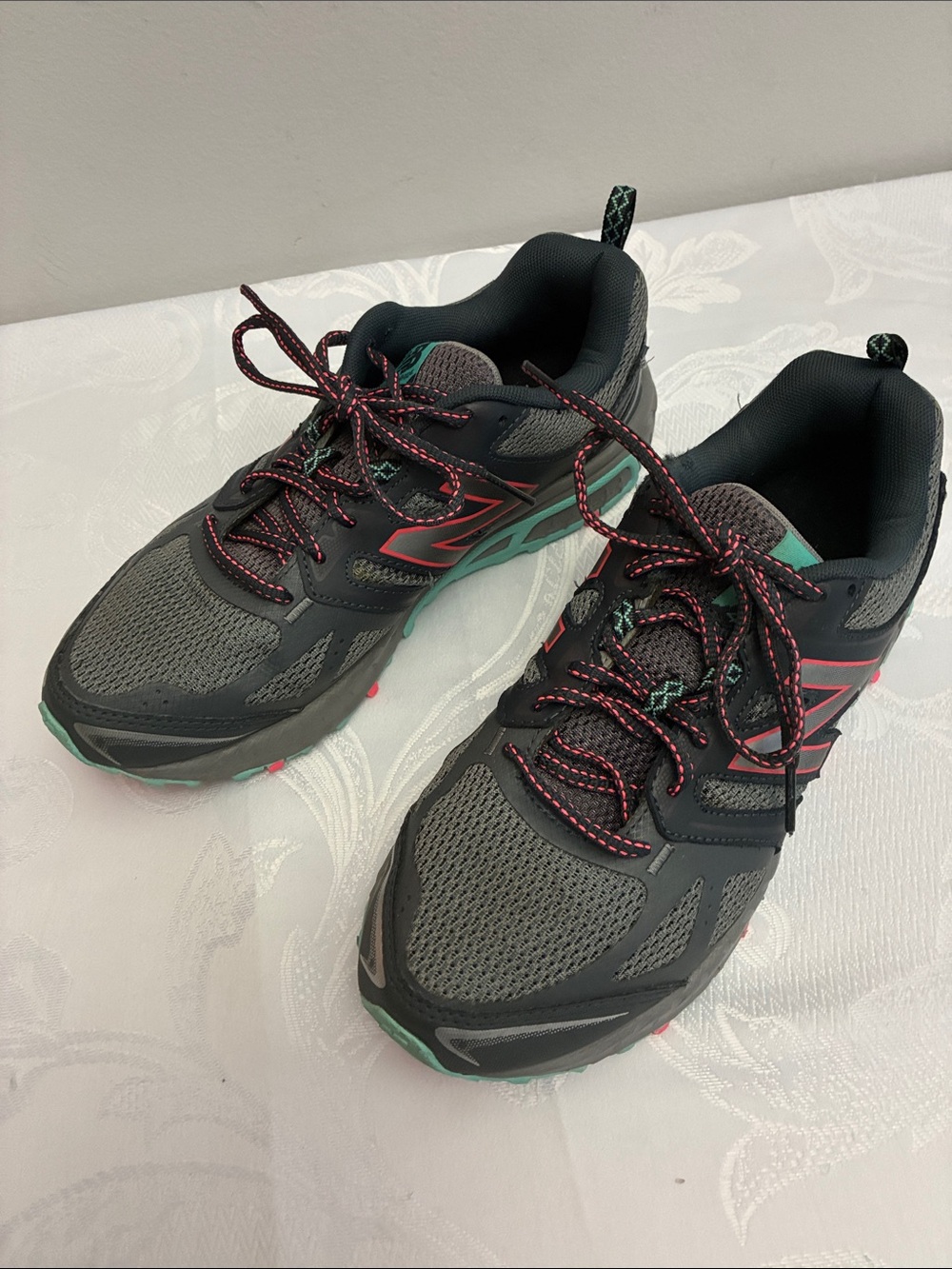 New Balance Dark Gray Athletic Shoes with Teal and Pink Accents